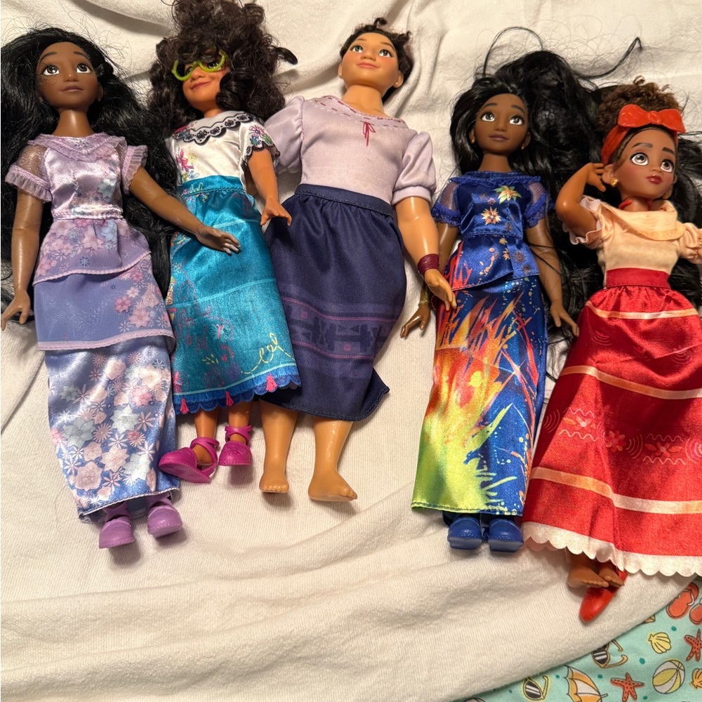 Disney Encanto Doll Collection with Colorful Dresses.